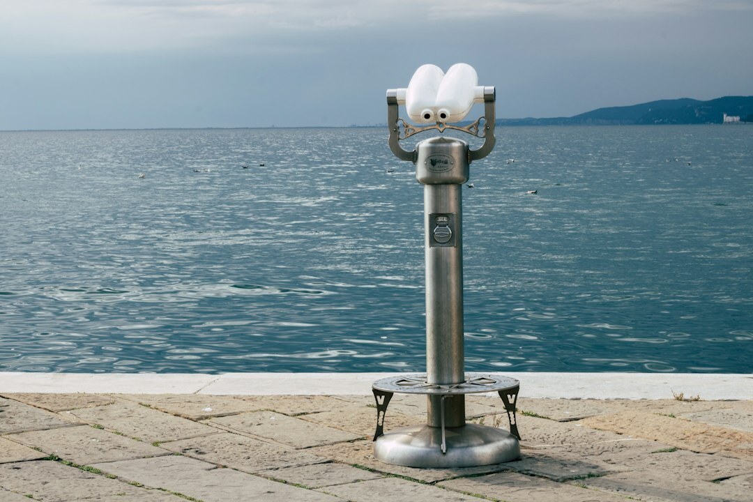 Robotic camera pedestal positioned on a television studio floor